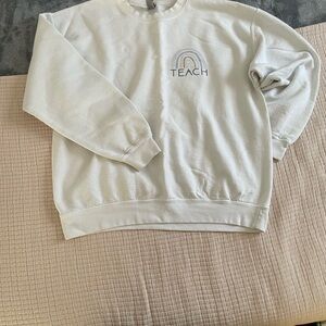 ‘TEACH’ CREWNECK WITH RAINBOW